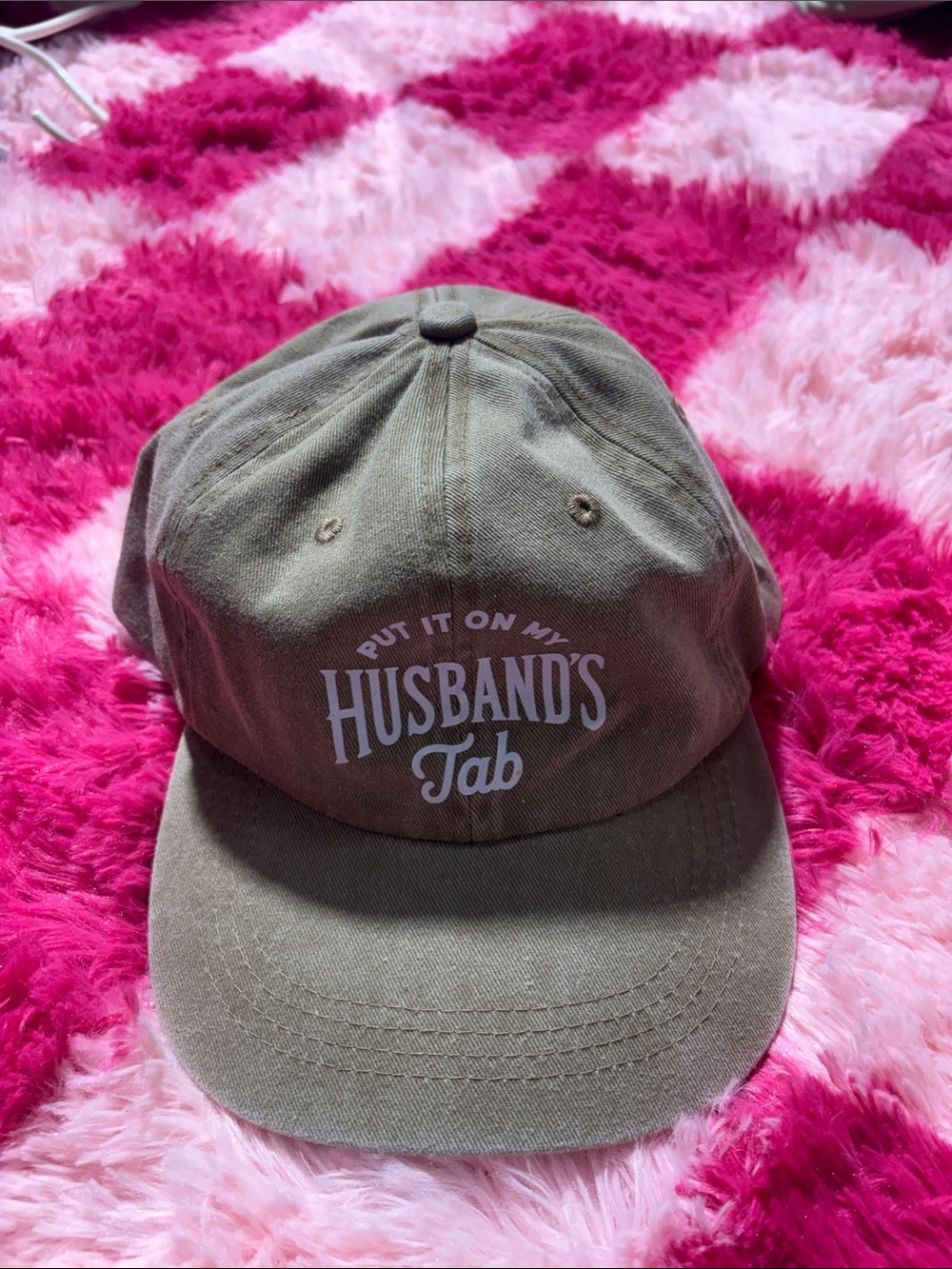 Put it on my husbands tab hat